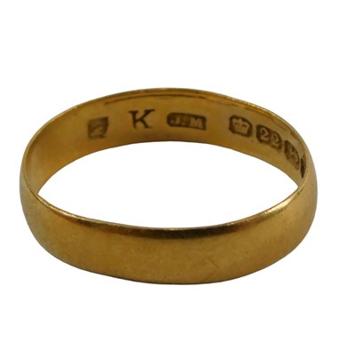Lot 347 - A 22ct gold wedding band, of plain design,...