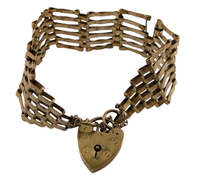 Lot 382 - A 9ct gold gate bracelet, of six bar design,...