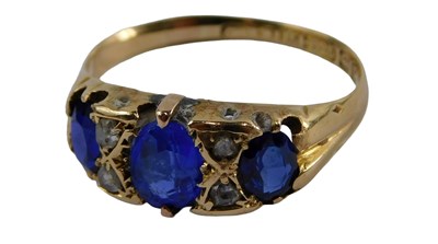 Lot 404 - A 15ct gold dress ring, set with three oval...