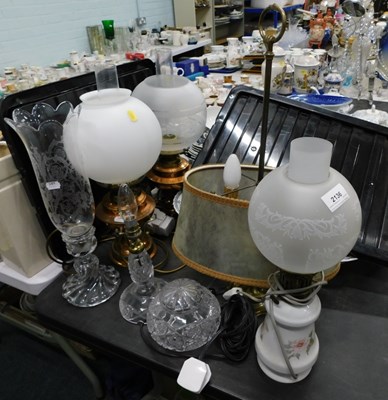 Lot 2136 - A collection of electric lamps, to include cut...
