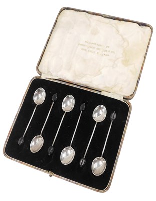 Lot 452 - A set of George V silver bean handled coffee...