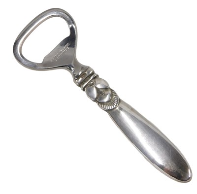 Lot 456 - A Georg Jensen bottle opener, with sterling...