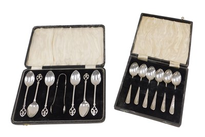 Lot 509 - A set of George V silver teaspoons and...