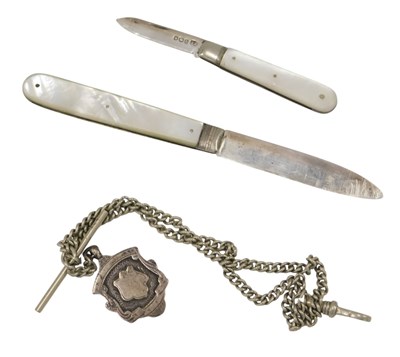 Lot 472 - Two silver pocket fruit knives with mother of...
