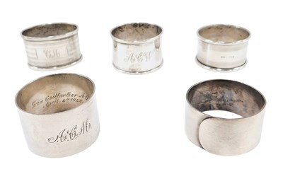 Lot 463 - Three silver napkin rings and two EP napkin...