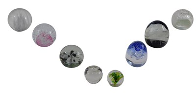 Lot 544 - A group of 20thC glass paperweights, to...