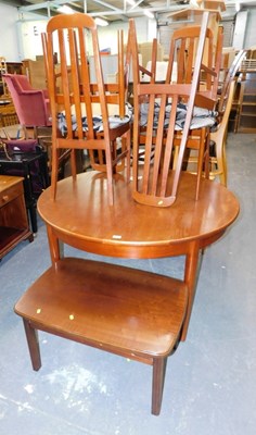 Lot 1501 - A circular teak dining table, 73cm high, 122cm...