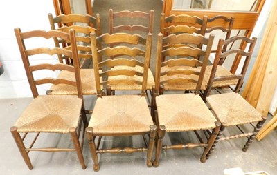 Lot 1508 - Eight oak dining chairs, with ladder backs,...
