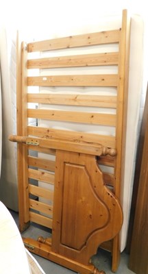 Lot 1536 - A pine single bed frame, with headboard and...