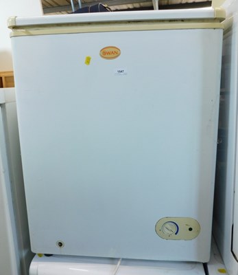Lot 1547 - A Swan mini chest freezer.