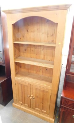 Lot 1553 - A pine kitchen dresser, with three shelves,...