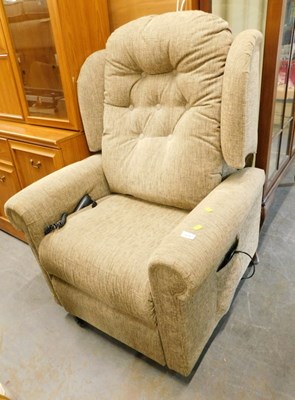 Lot 1579 - An electric recliner armchair, in grey and tan...