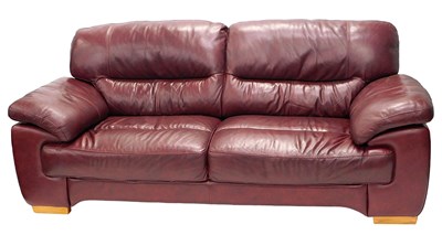 Lot 824 - A modern three seater red leather sofa, 220cm...