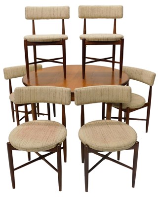 Lot 842 - A G-Plan extending oval teak dining table, and...