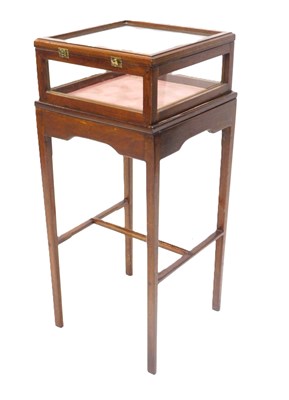 Lot 844 - A small square mahogany display table, the...