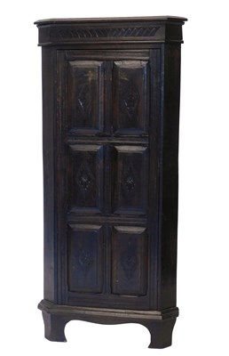 Lot 928 - An early 20thC dark stained carved oak...