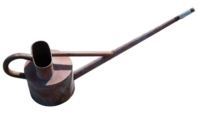 Lot 794 - A red painted galvanised watering can.