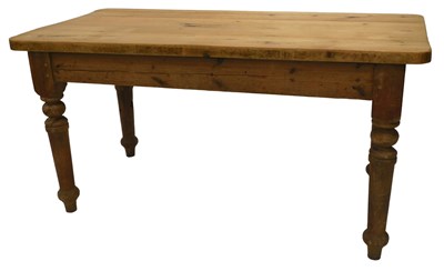 Lot 857 - A pine farmhouse kitchen table, with rounded...