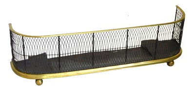 Lot 858 - A Victorian brass framed fire fender, with...