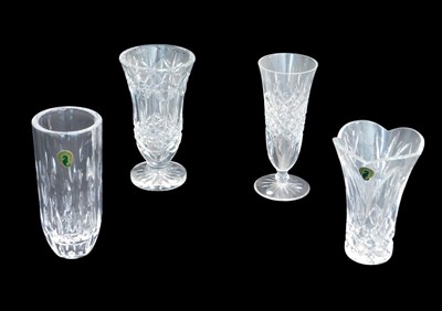 Lot 675 - Four Waterford crystal stem vases, one with...