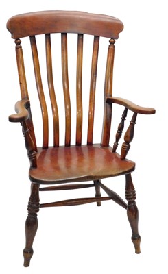 Lot 864 - A late 19thC elm and beech lath back...
