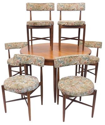 Lot 865 - A G-plan oval teak extending dining table, and...