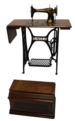 Lot 867 - A Singer treadle sewing machine.