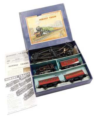 Lot 150 - A 1950s Hornby O gauge train set, with a black...