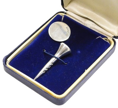 Lot 151 - An Elizabeth II silver golf tee and ball...