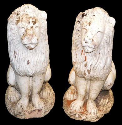 Lot 180 - A pair of white painted concrete garden lions,...