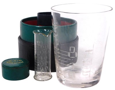 Lot 282 - An early 20thC cut glass medicine measuring...