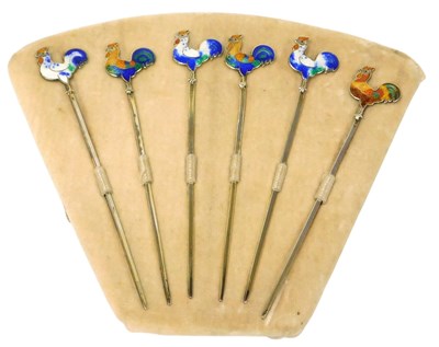 Lot 312 - A set of six silver and enamel cocktail sticks,...