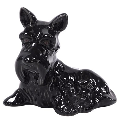 Lot 323 - A Wade black pottery figure of a Scottie dog,...