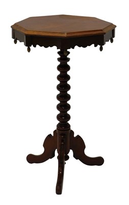 Lot 874 - A mahogany occasional table, the octagonal top...
