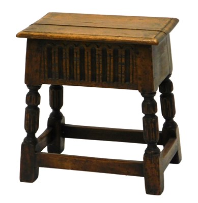 Lot 878 - An oak work table in 17thC style, the hinged...