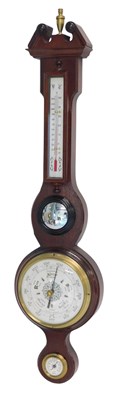 Lot 602 - A Huger aneroid barometer, in a mahogany case...