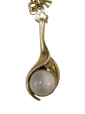 Lot 597 - A 9ct gold pendant and chain, the abstract...