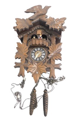 Lot 609 - A Black Forest carved wooden cuckoo...