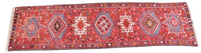 Lot 763 - A Persian runner, with a design of medallions...