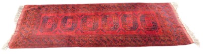 Lot 764 - A Turkish rug, with a design of medallions, on...
