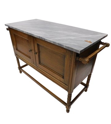 Lot 728 - An early 20thC oak washstand, with a grey...