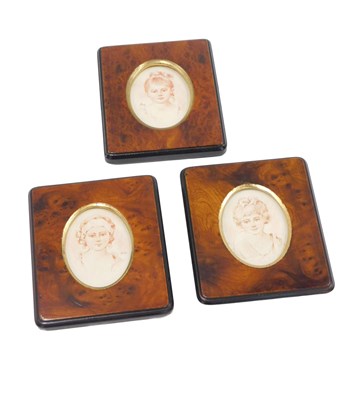 Lot 517 - Three portrait miniatures by Linzi, comprising...