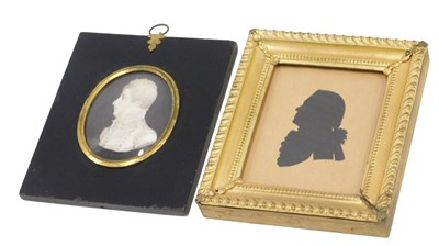 Lot 518 - A 19thC portrait miniature and a silhouette,...