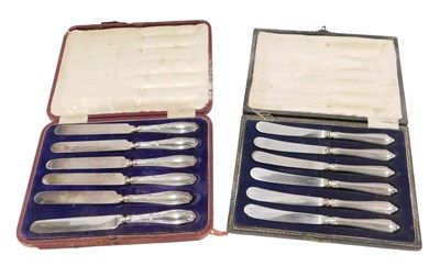 Lot 483 - Two sets of silver handled tea knives, both...