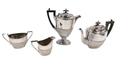 Lot 592 - A silver plated tea and coffee set by Walker &...
