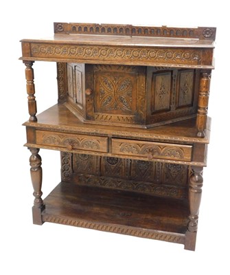 Lot 746 - An oak buffet in 17thC style, the top with a...