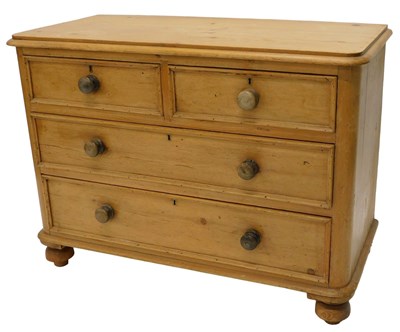 Lot 753 - A pine chest of drawers, the top with a...
