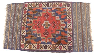 Lot 757 - A Persian rug, with a large shaped medallion...