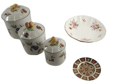 Lot 897 - Three Royal Worcester Evesham pattern jars and...