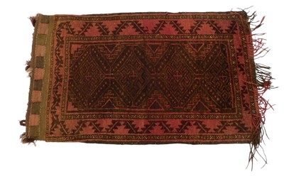 Lot 758 - A Persian saddle bag, with three medallions,...
